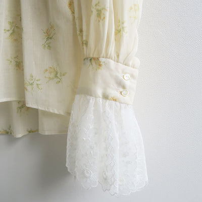 【FUMIKA UCHIDA/フミカウチダ】 <br>FLOWER PRINTED RUFFLE HIGH-NECK BLOUSE <br>U-SH004