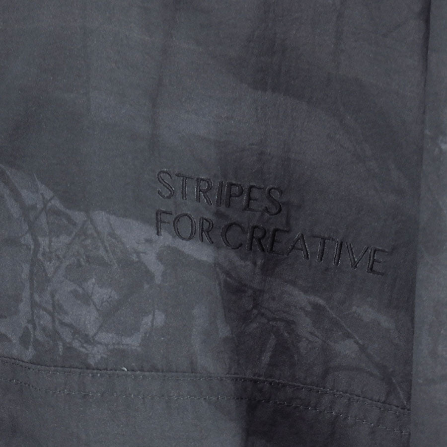 【S.F.C/エスエフシー】<br>WINDBREAKER JACKET (REAL TREE CAMO) <br>SFCFW25J06