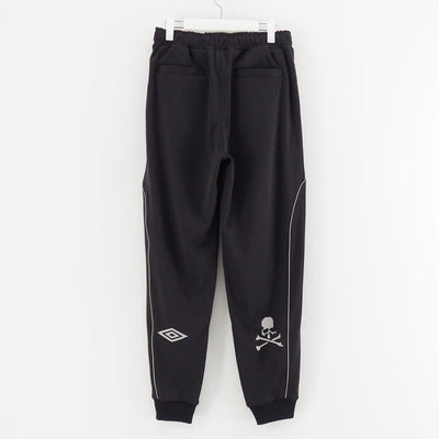 【MASTERMIND WORLD/マスターマインドワールド】<br>UMBRO TRACK PANTS <br/>MW25C14-PA106