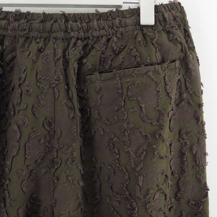 【M A S U/エムエーエスユー】<br>VICK CAMO RIBBON EASY PANTS <br>M25F9PL008